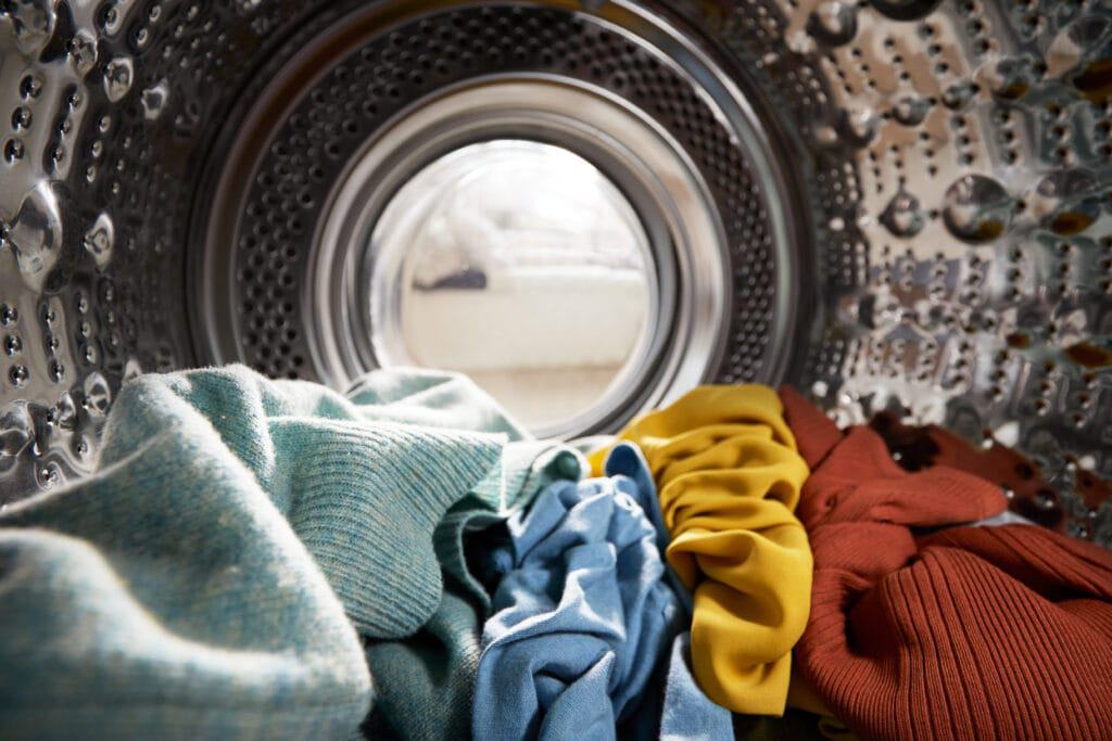 View of inside a washing machine. Laundry is one of the essential life skills