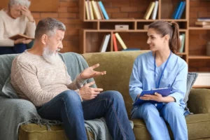 Man and woman discussing what to look for in a residential treatment program
